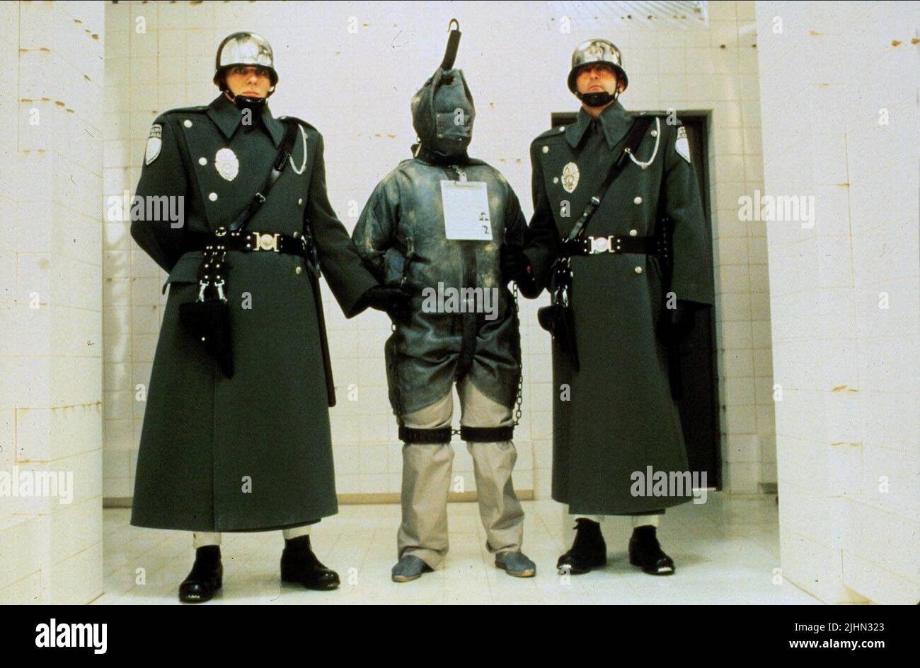 PRISONER, GUARDS, BRAZIL, 1985 Stock Photo