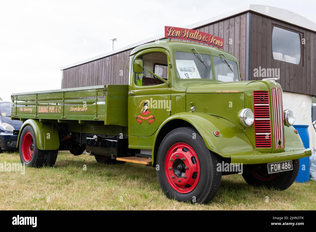 West Bay.Dorset.United Kingdom.June 12th 2022.A restored 1947 Austin K4 truck formerly used by the Eldridge Pope brewery is on display at the West bay Stock Photo