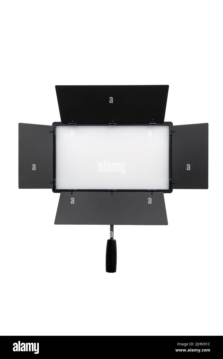 Photo and video lamp isolate on white background. LED lamp with special shutters for the formation of light flux. Photo and video lighting fixture. Stock Photo