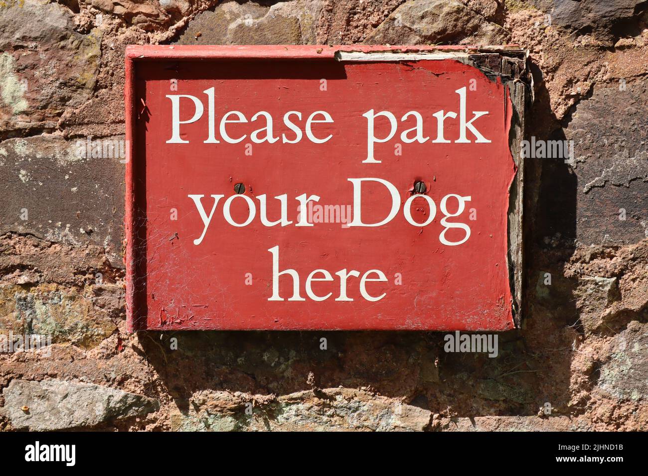 Falling Apart Sign Humorous sign requesting that dogs can be left here. The sign is o;d ...