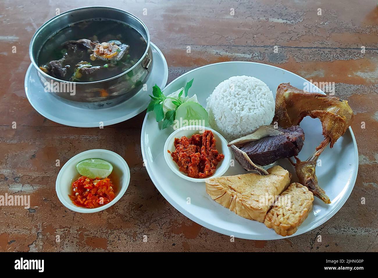 Fried Beef Ribs and Fried Chicken at Resto Jakarta, Indonesia Stock Photo