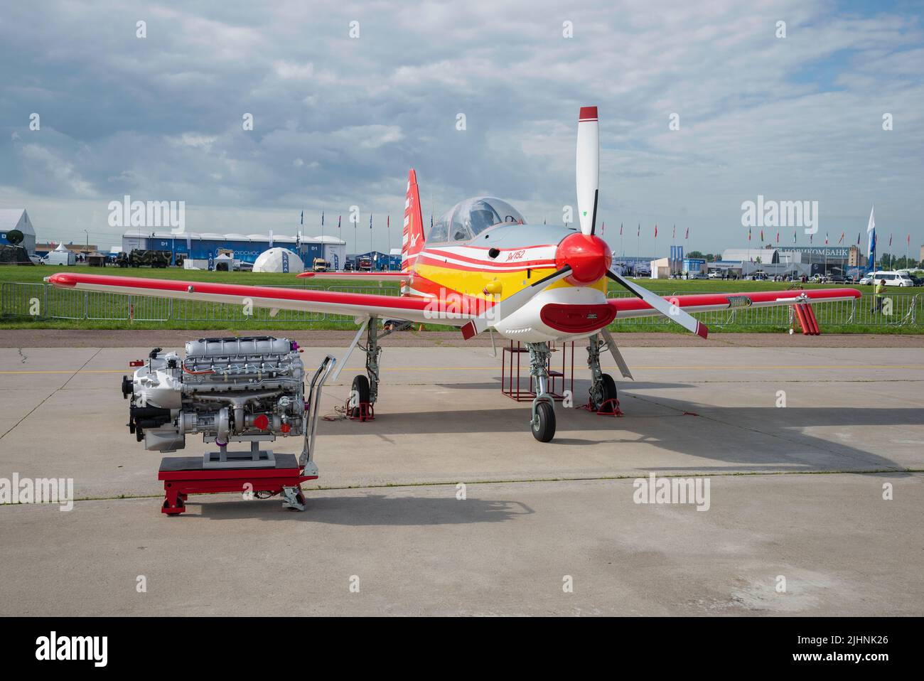 ZHUKOVSKY, RUSSIA - JULY 20, 2017: Yak-152 - piston training aircraft and its engine in the exposition of the MAKS-2017 airshow Stock Photo