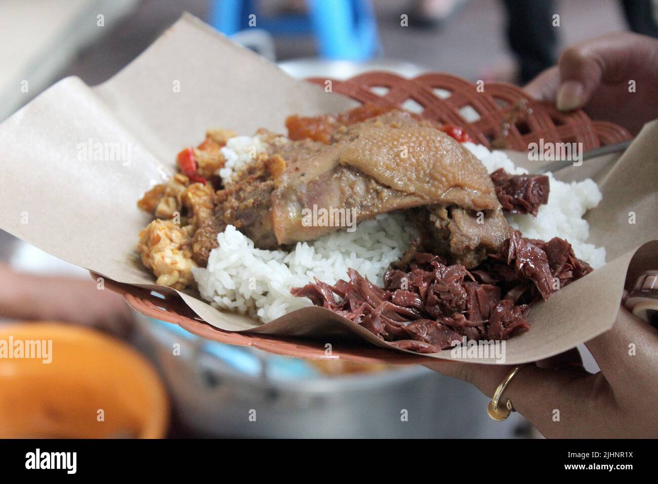 gudeg food, serve with white rice, tempe and chicken. Street food in Yogyakarta, Indonesia Stock Photo