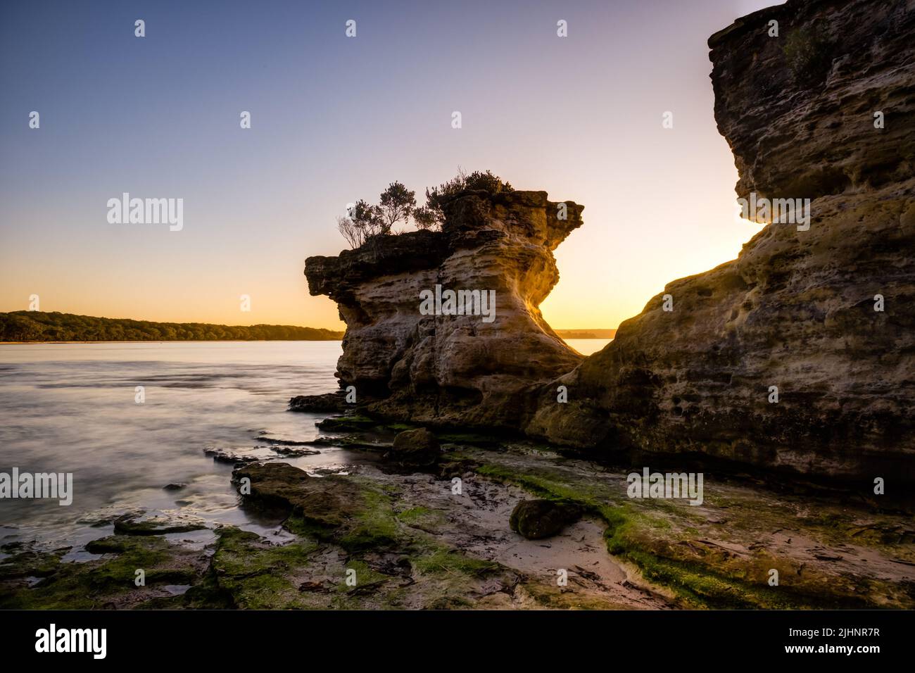 Sunset scene over rocky coastline hi-res stock photography and images ...