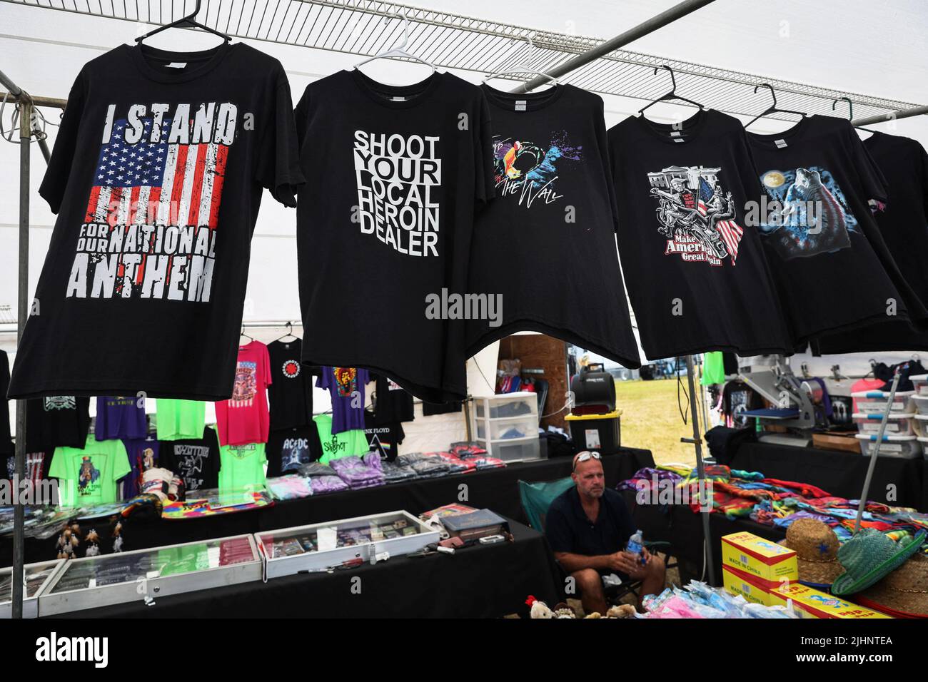 Tee shirts for sale are displayed by a vendor at the 2022 Saratoga County Fair in Ballston Spa, New York, U.S., July 19, 2022. REUTERS/Shannon Stapleton Stock Photo