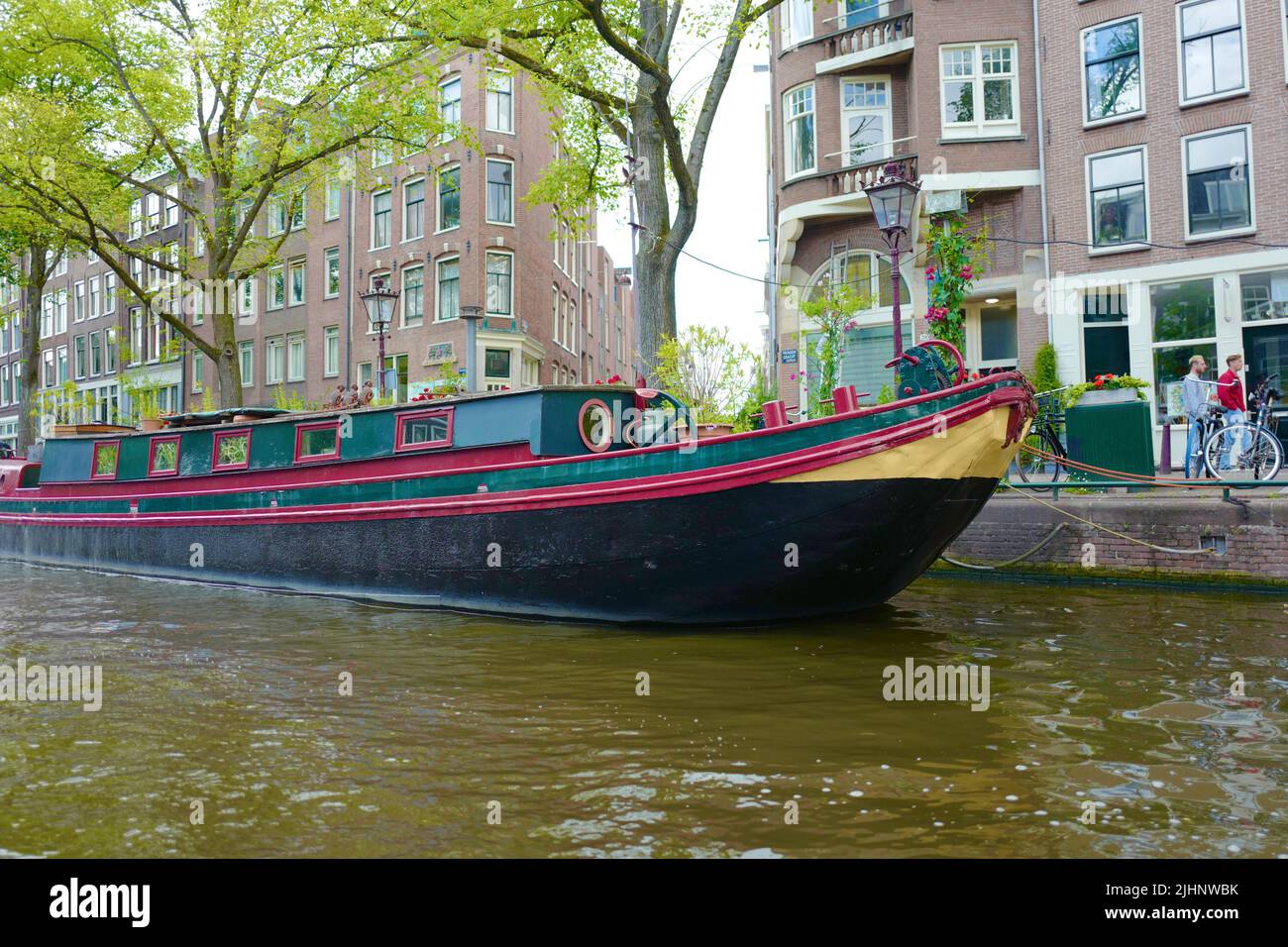Colorfull barge on Prinsengracht in Amsterdam Stock Photo