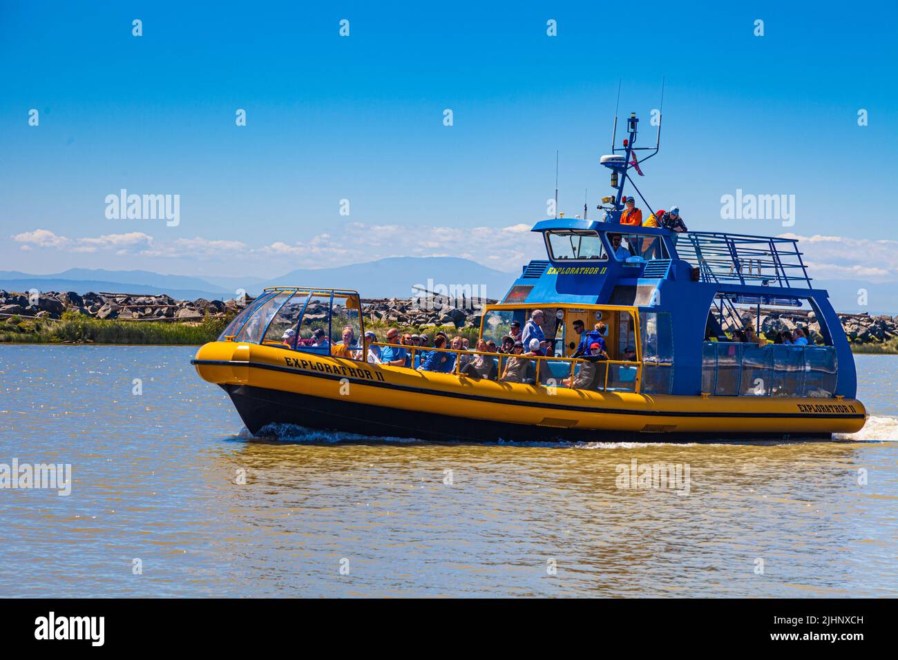 Whale watching excursion returning to Steveston Harbour in British Columbia Canada Stock Photo