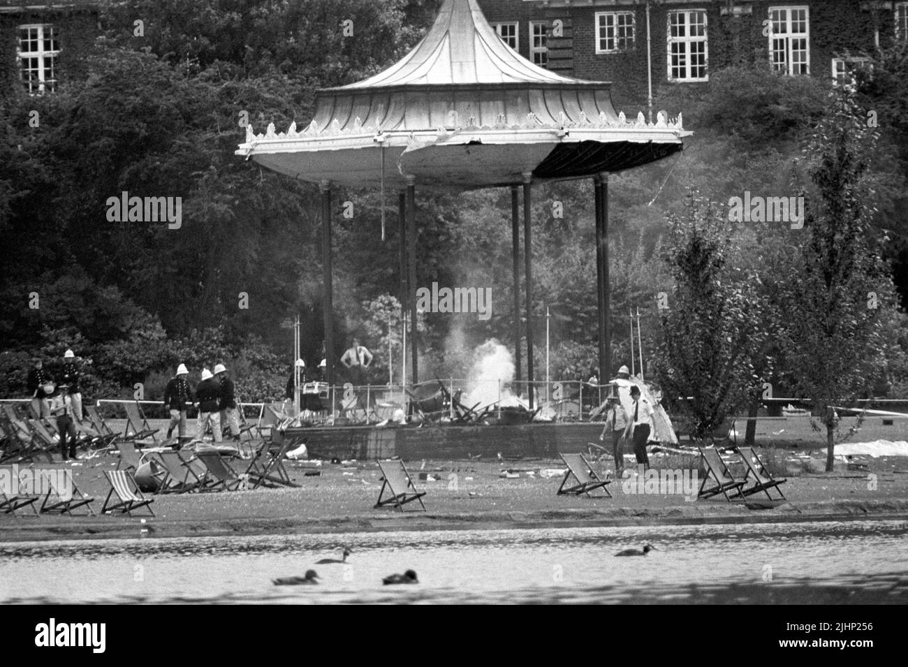 File photo dated 20/7/1982 of police and firemen at the still-smouldering bandstand in Regents Park, London, following the IRA bomb blast that killed six people and left many others seriously injured. The families of soldiers killed in the Hyde Park and Regent's Park IRA bombings have told how their suffering remains undiminished 40 years on. In total 11 military personnel died in the two attacks which occurred within hours of each other in London on July 20 1982. Issue date: Wednesday July 20, 2022. Stock Photo