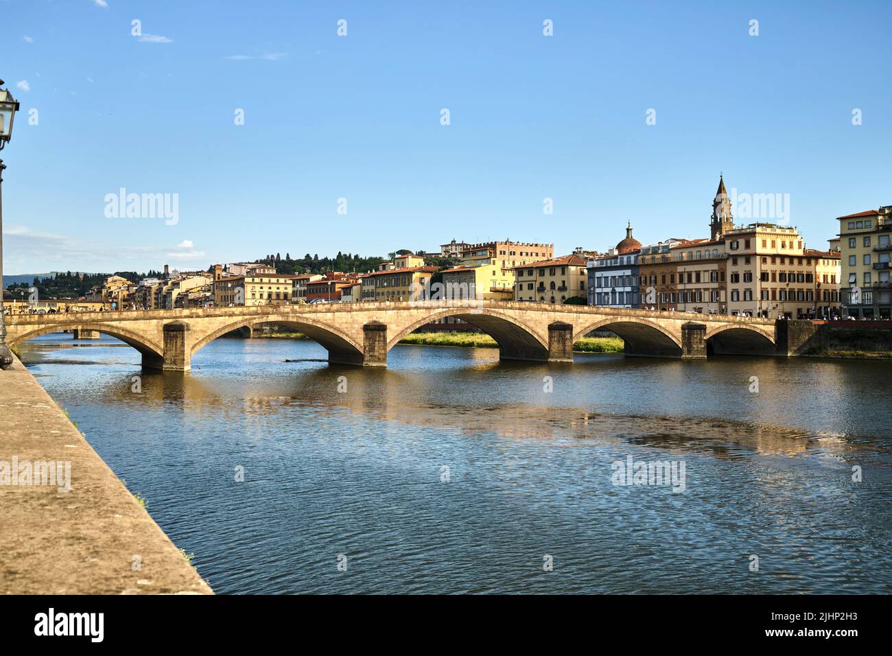 Ponte Santa Trinita Bridge and the River Arno in Florence Italy Stock Photo