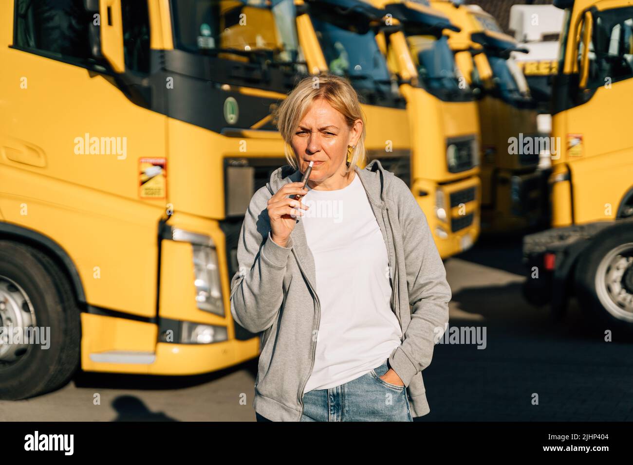 truck driver smoking cigarettes Portrait woman working smoking cigarette hi-res stock photography and  images