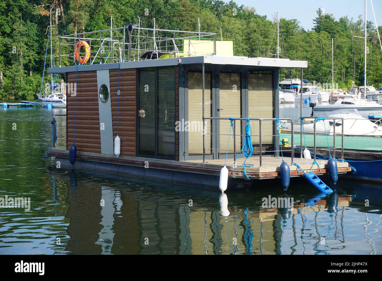 Modern houseboat in port Stock Photo Alamy