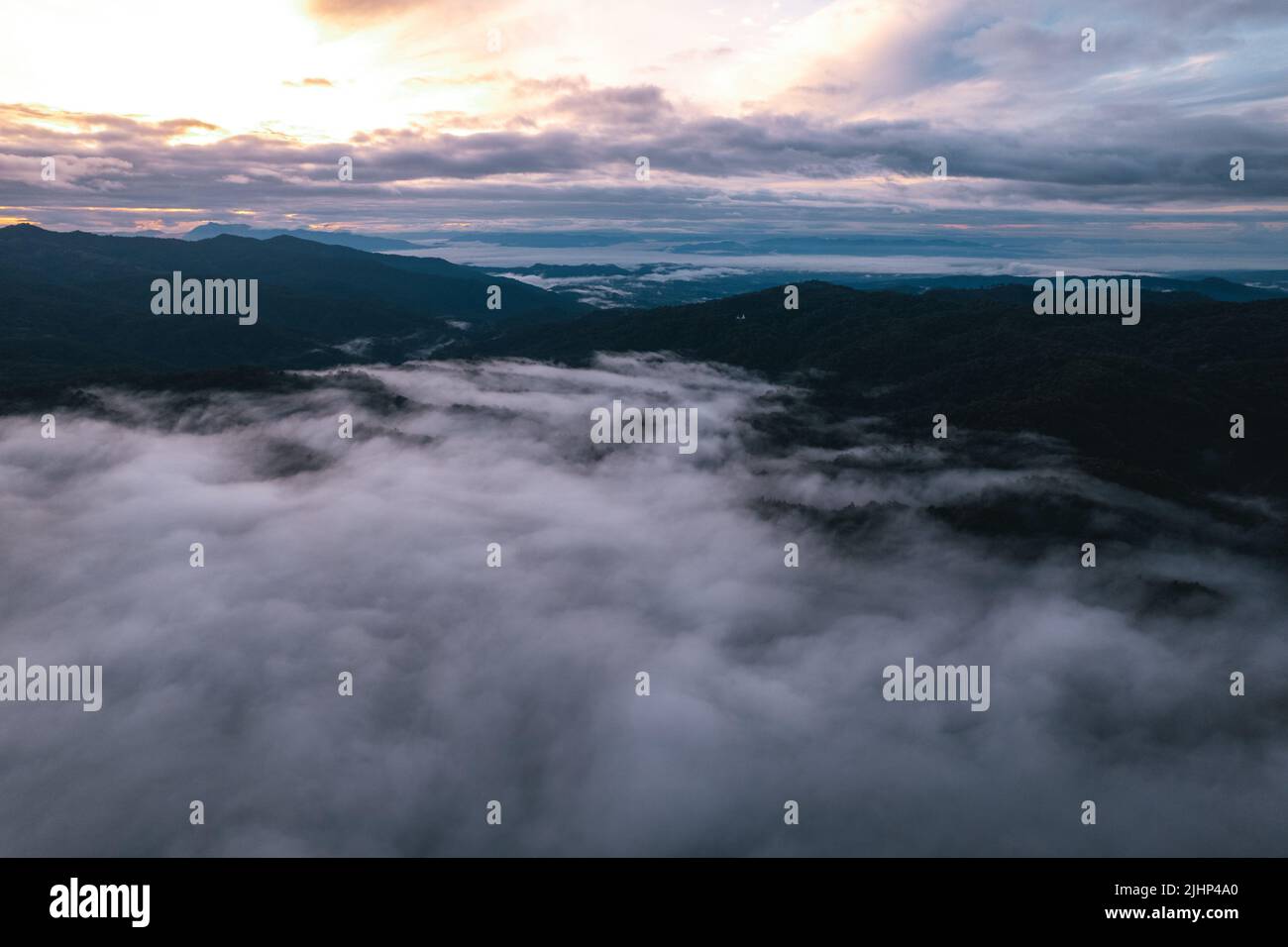 fog and clouds in the morning in the forest form above Stock Photo - Alamy
