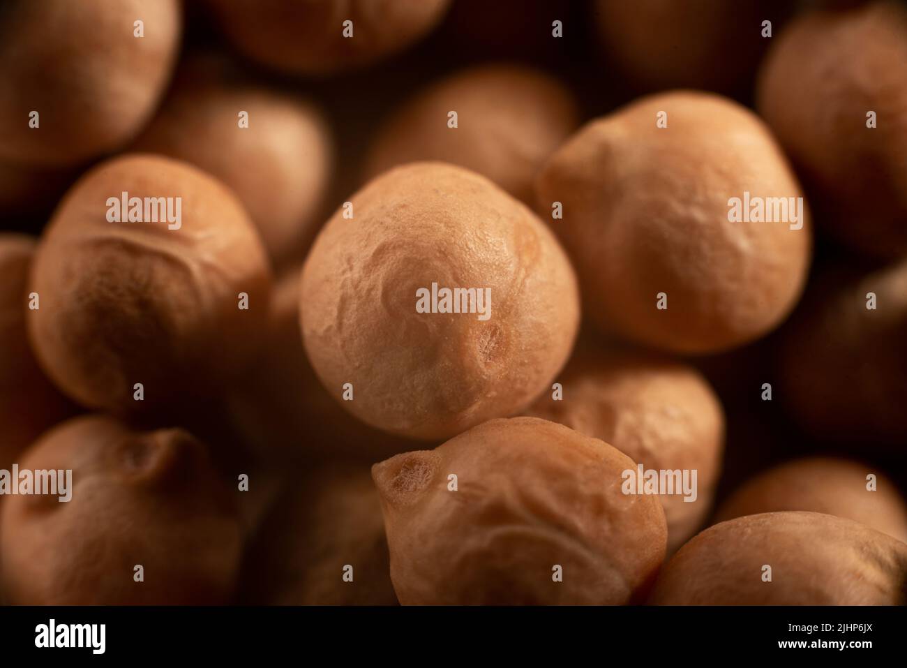 a pile of dried chickpeas. Close-up. Chickpeas nuts. Extreme closeup Stock Photo