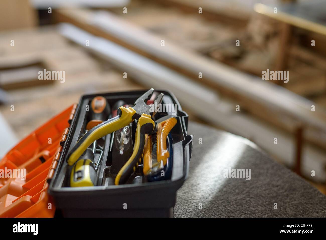 Tool box in apartment renovation area on floor Stock Photo Alamy