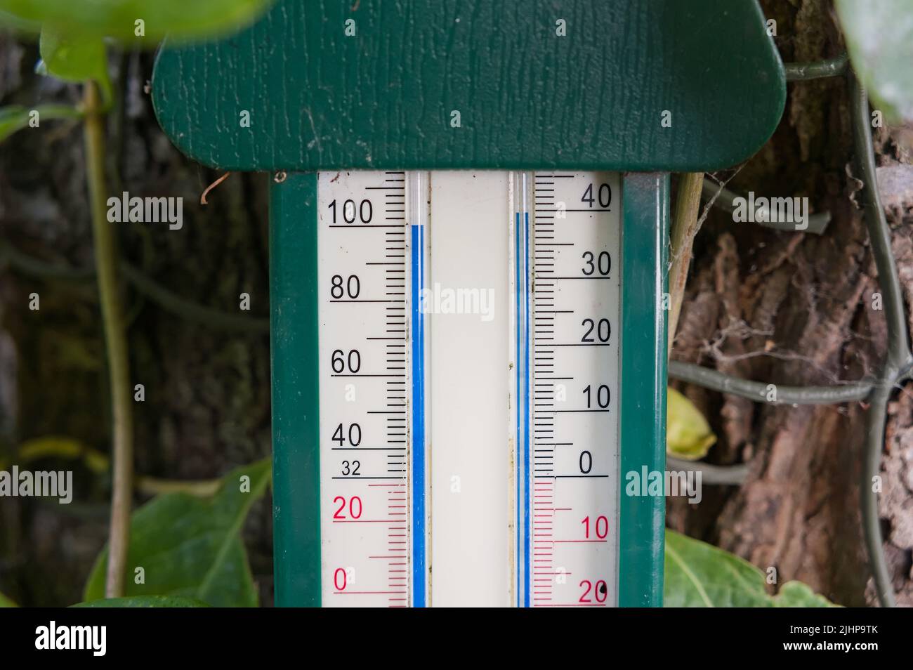 mercury thermometer reading nearly 40c 103f on a record breaking hot day in England Stock Photo