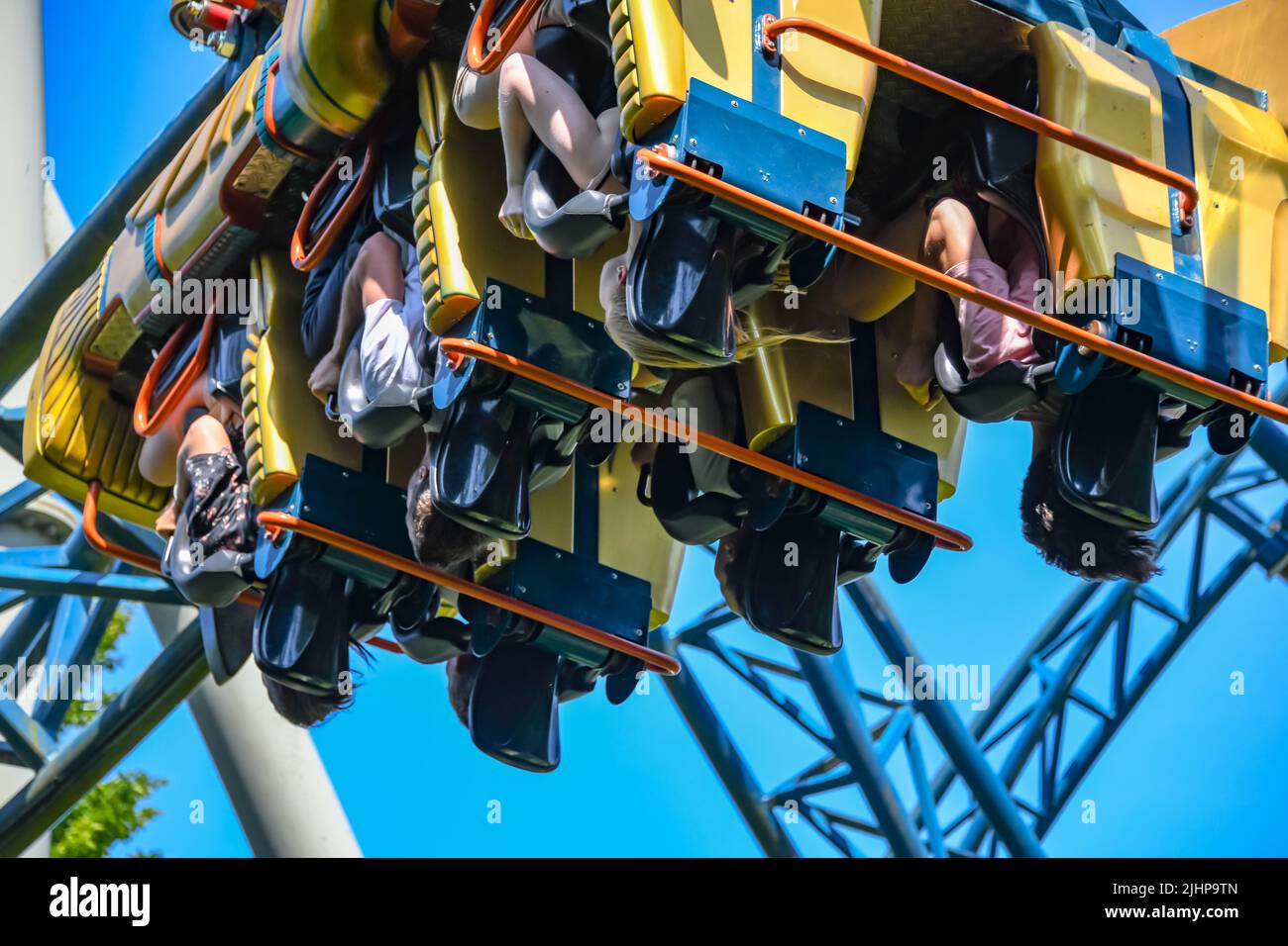 People ride 'Anubis The Ride', a steel roller coaster located at Plopsaland in Belgium Stock Photo