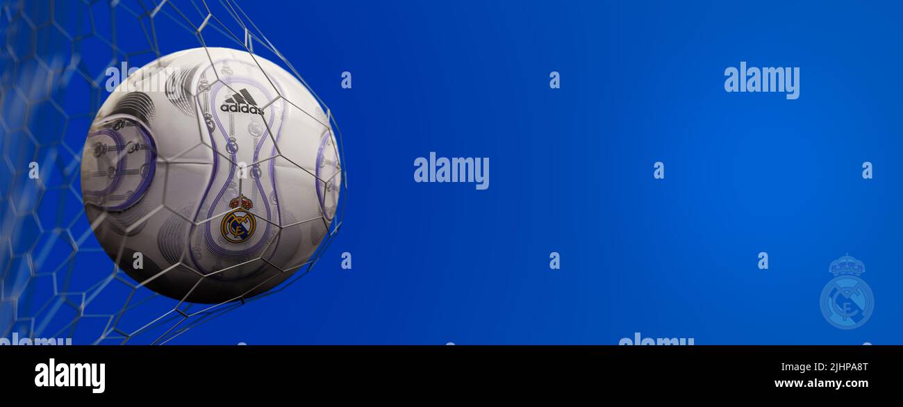 Guilherand-Granges, France - July 20, 2022. LaLiga santander of Spain. Soccer ball in net with official logo of Real Madrid. 3D rendering. Stock Photo