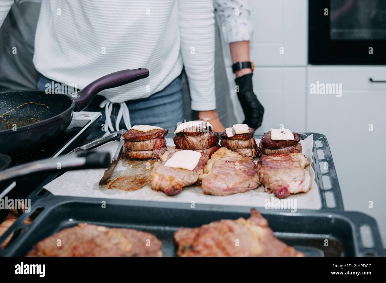 cooking steaks in a pan. cooking beef at the culinary master class. the