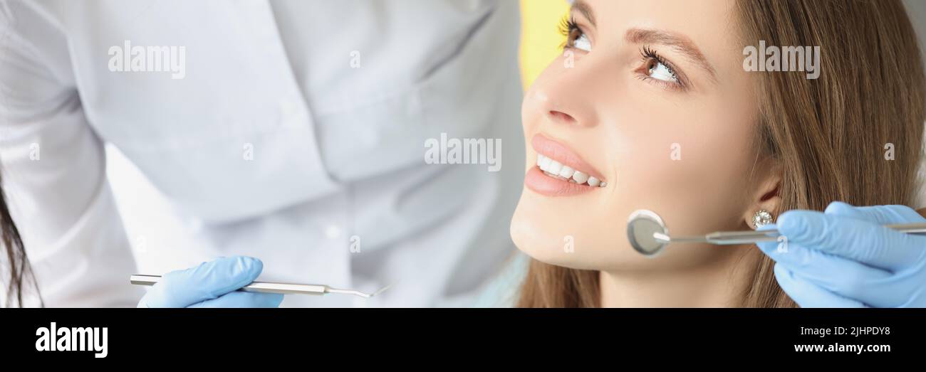 Female in dentist chair, appointment in dental clinic Stock Photo