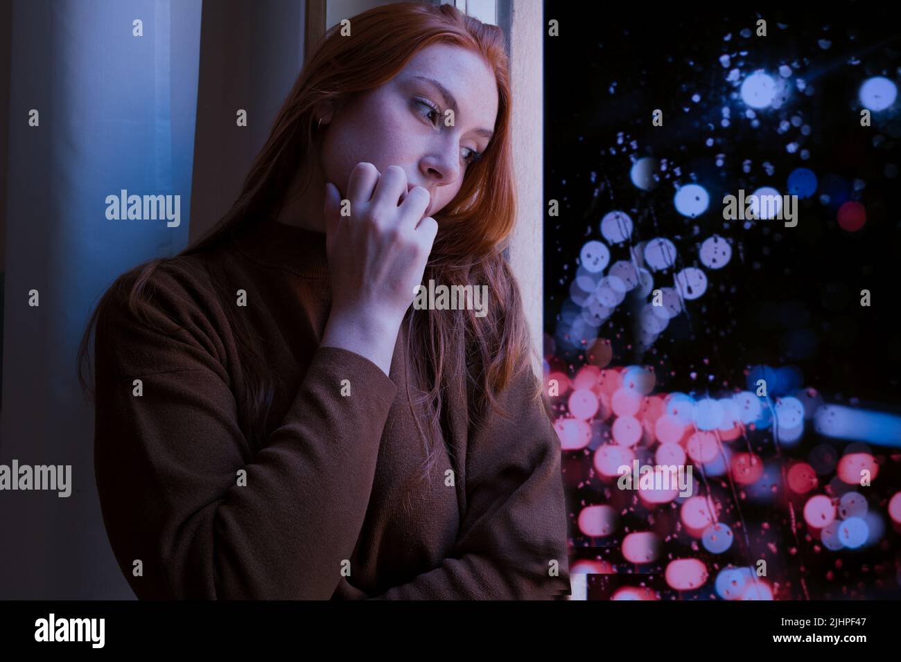 Depressed woman suffering seasonal depression, feeling blue Stock Photo