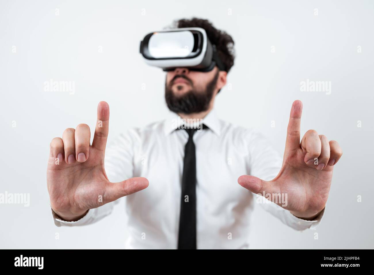 Man Wearing Vr Glasses And Presenting Important Messages Between Hands