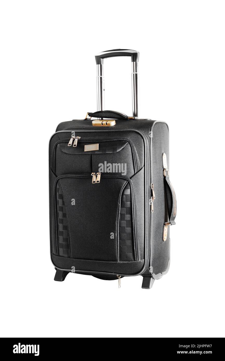 Travel suitcase on wheels. Close-up. Isolated on light gray background. Stock Photo