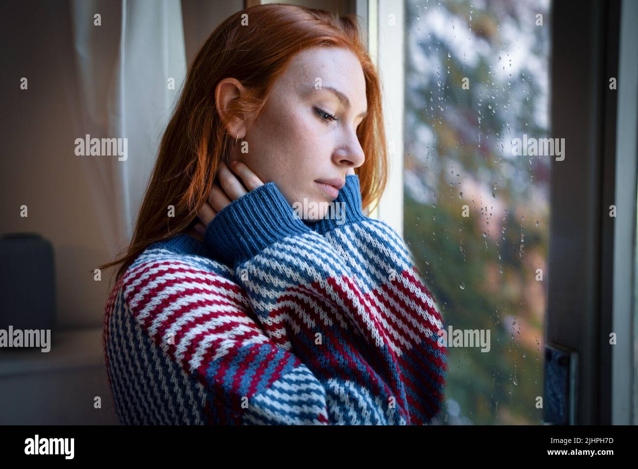 Depressed woman suffering seasonal depression, feeling blue Stock Photo