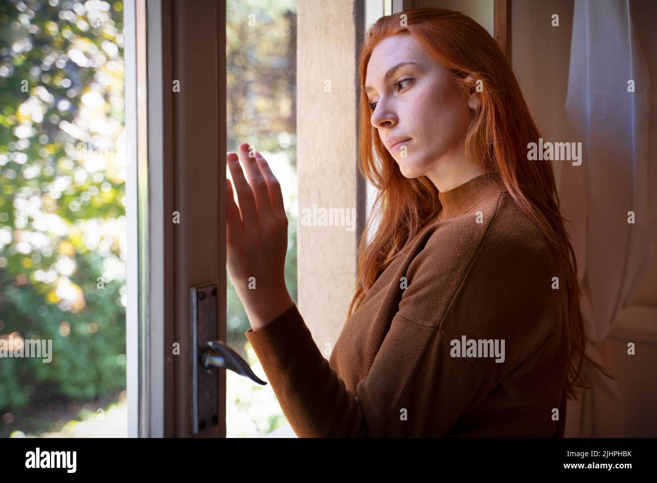 Depressed woman suffering seasonal depression, feeling blue Stock Photo