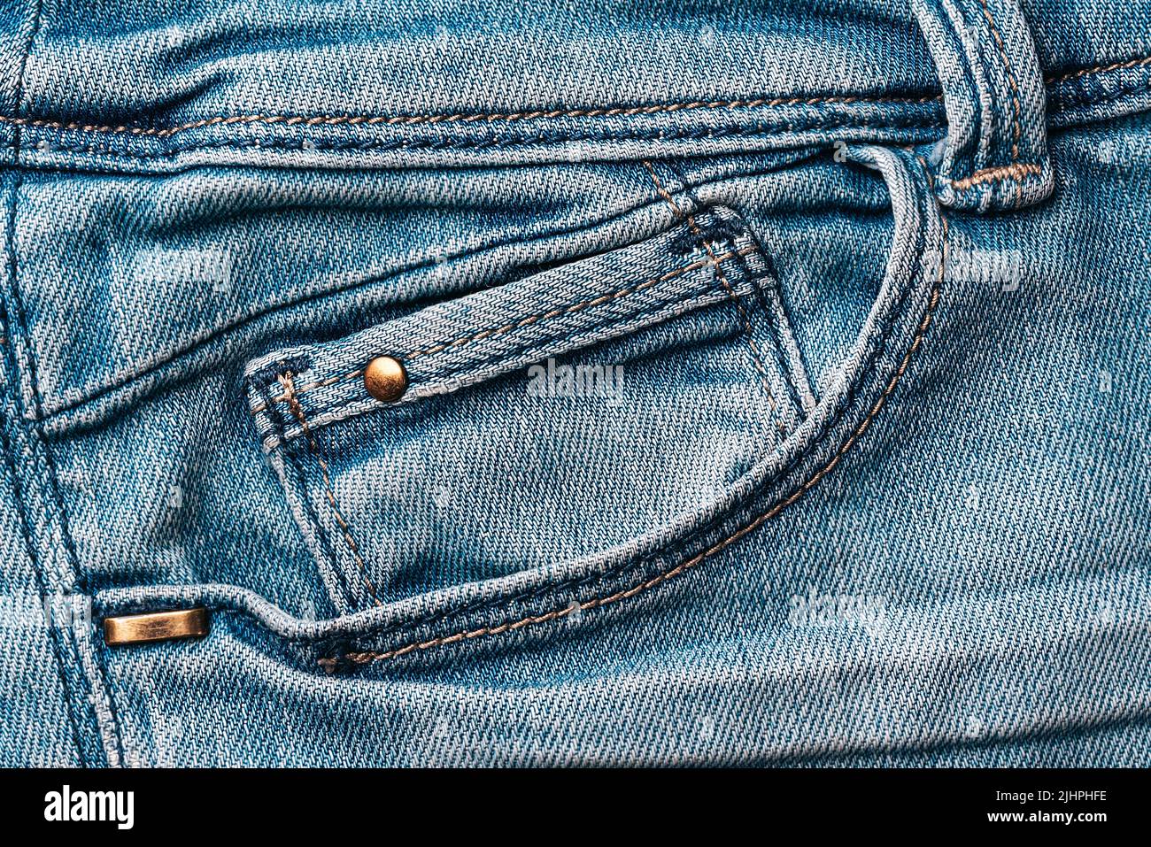 Old Blue jeans fabric denim texture background for design. Canvas denim.  Close up view Stock Photo - Alamy