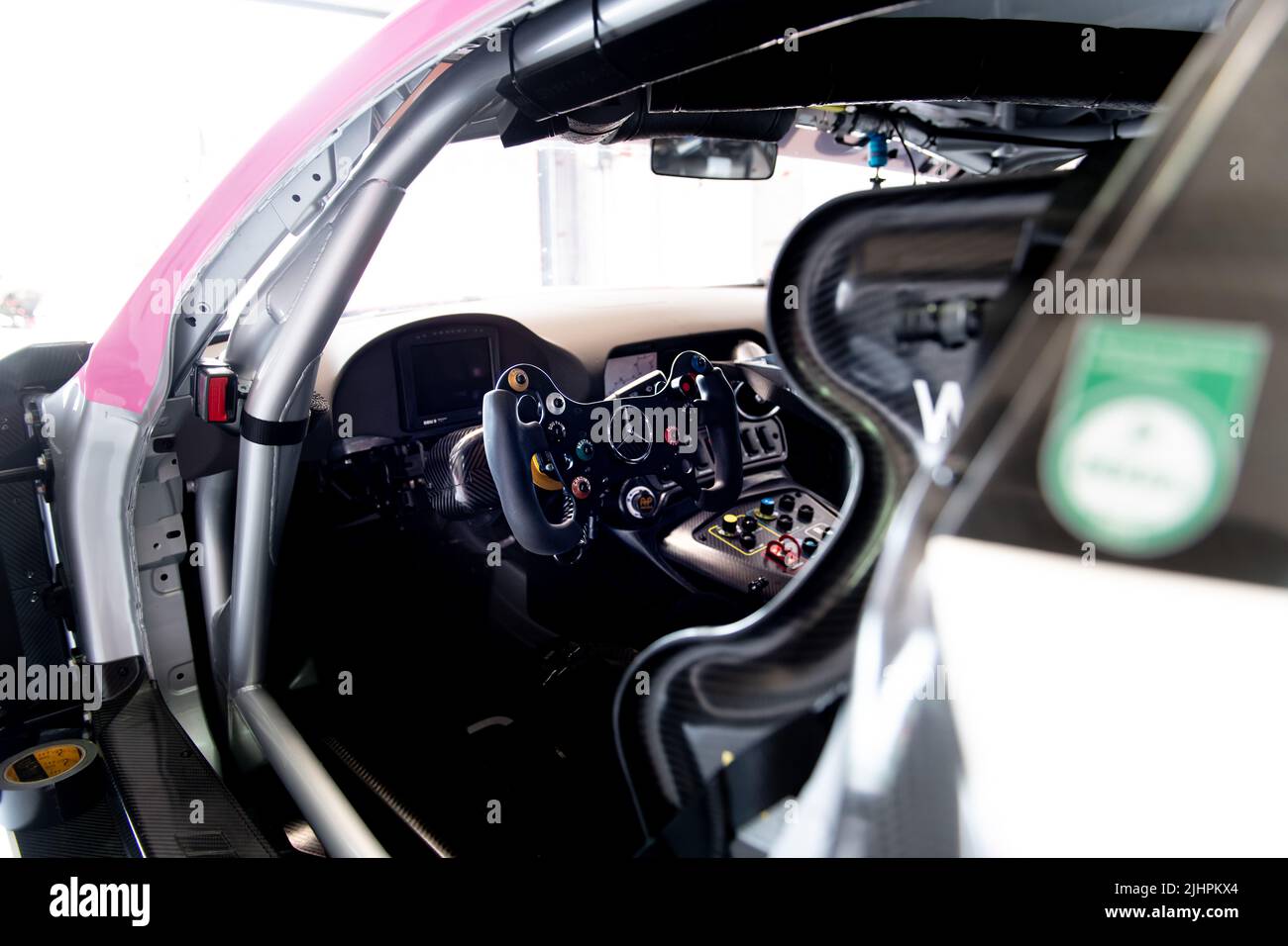 Car racing steering wheel in Mercedes AMG GT car cockpit no people. Imola, Italy, june 17 2022. DTM Stock Photo