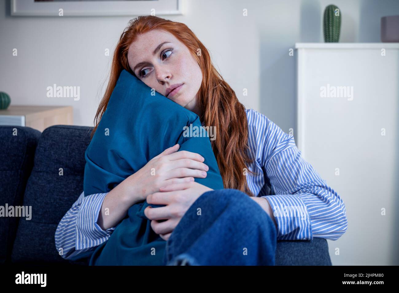 Lonely young woman feeling alone and negative emotion Stock Photo