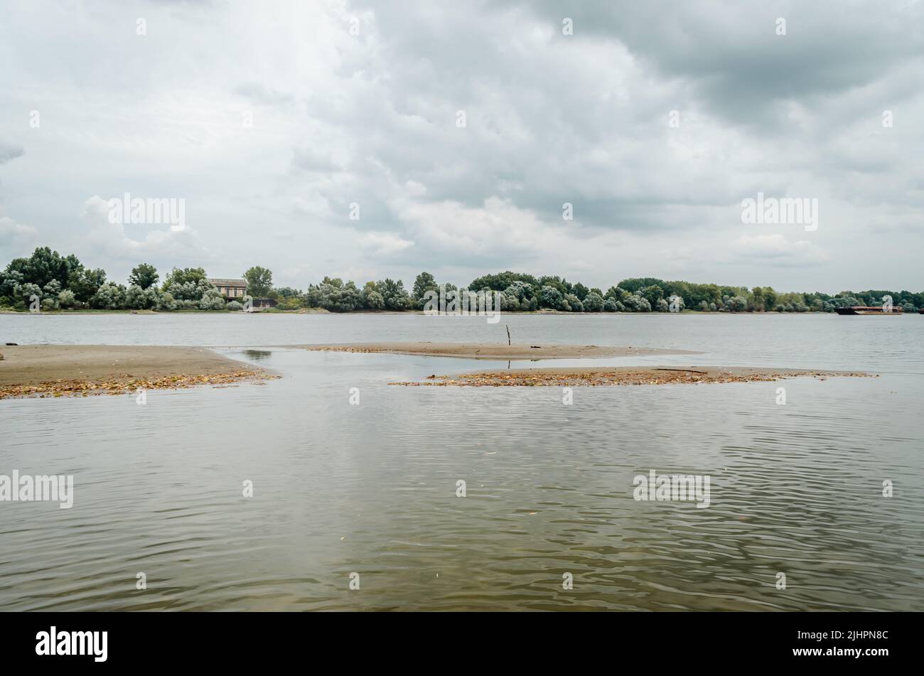 The sandy bank of the Danube River near the city of Novi Sad. Panorama banks of the river Danube