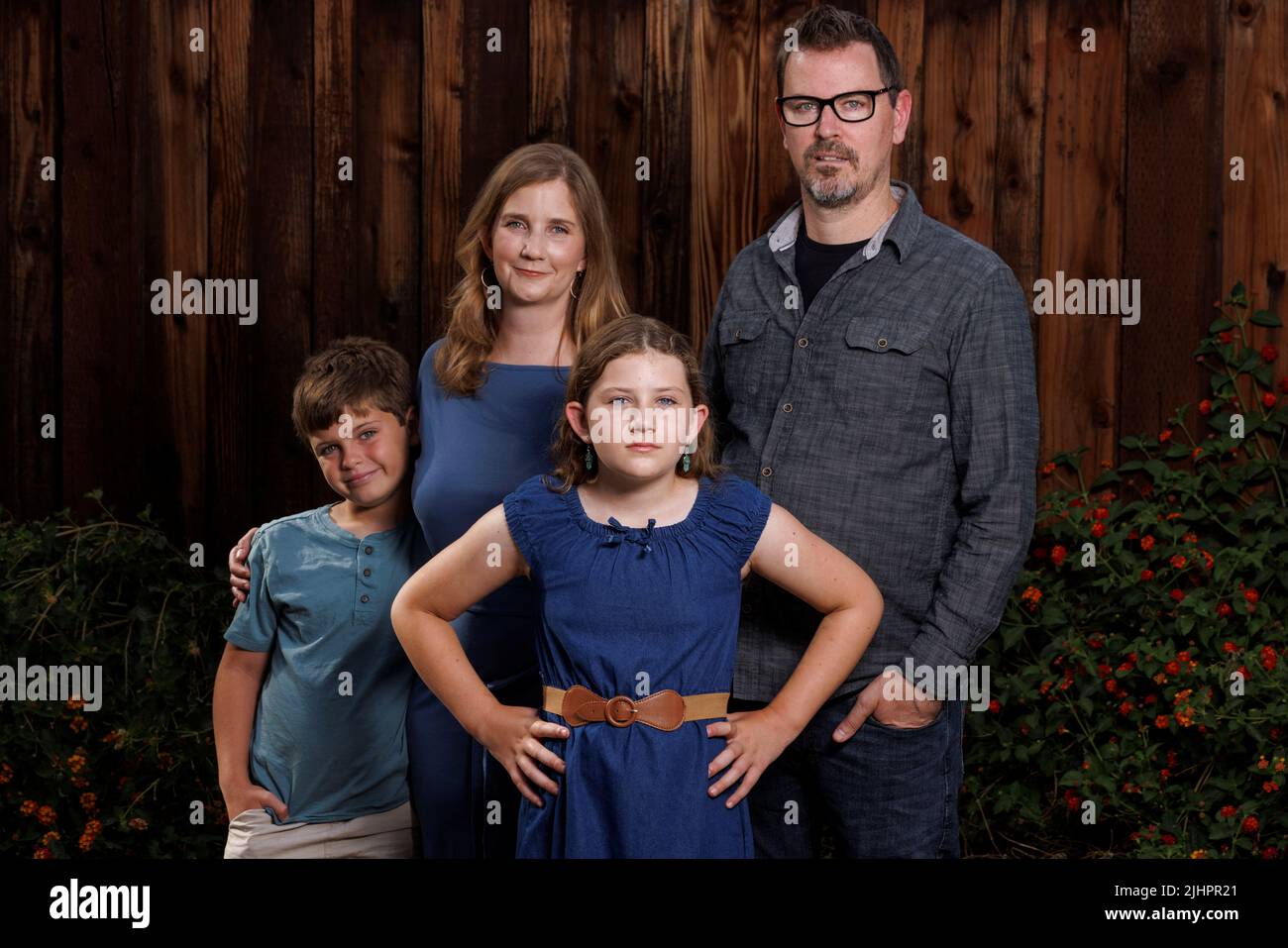 Cancer survivor Grace Bumstead poses for a picture with her brother Luke and parents Melissa and Chad in the back yard of their home in West Hills, California, U.S., June 22, 2022.       REUTERS/Mike Blake Stock Photo