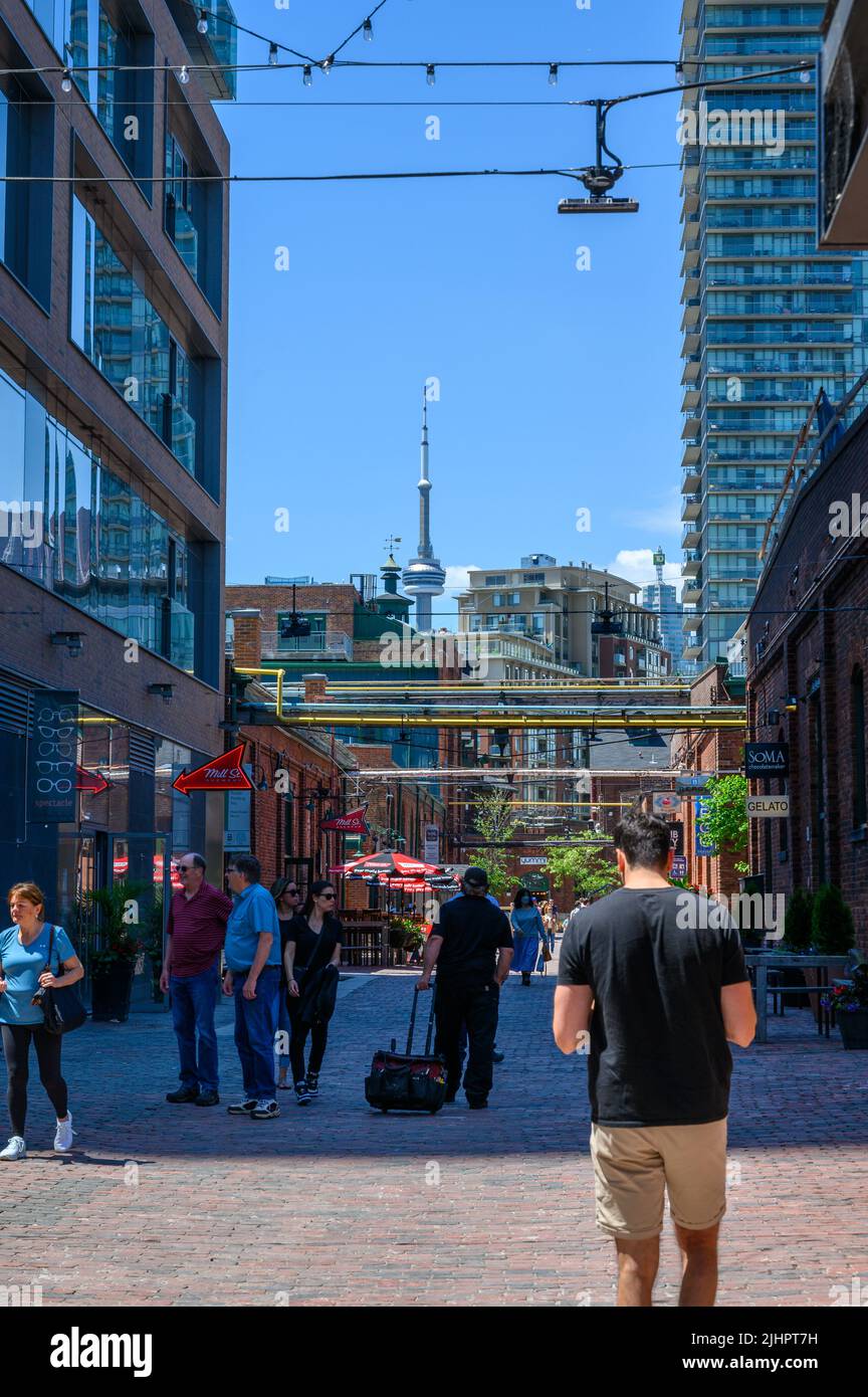Visitors and tourists walking along Tank House Lane in Distillery