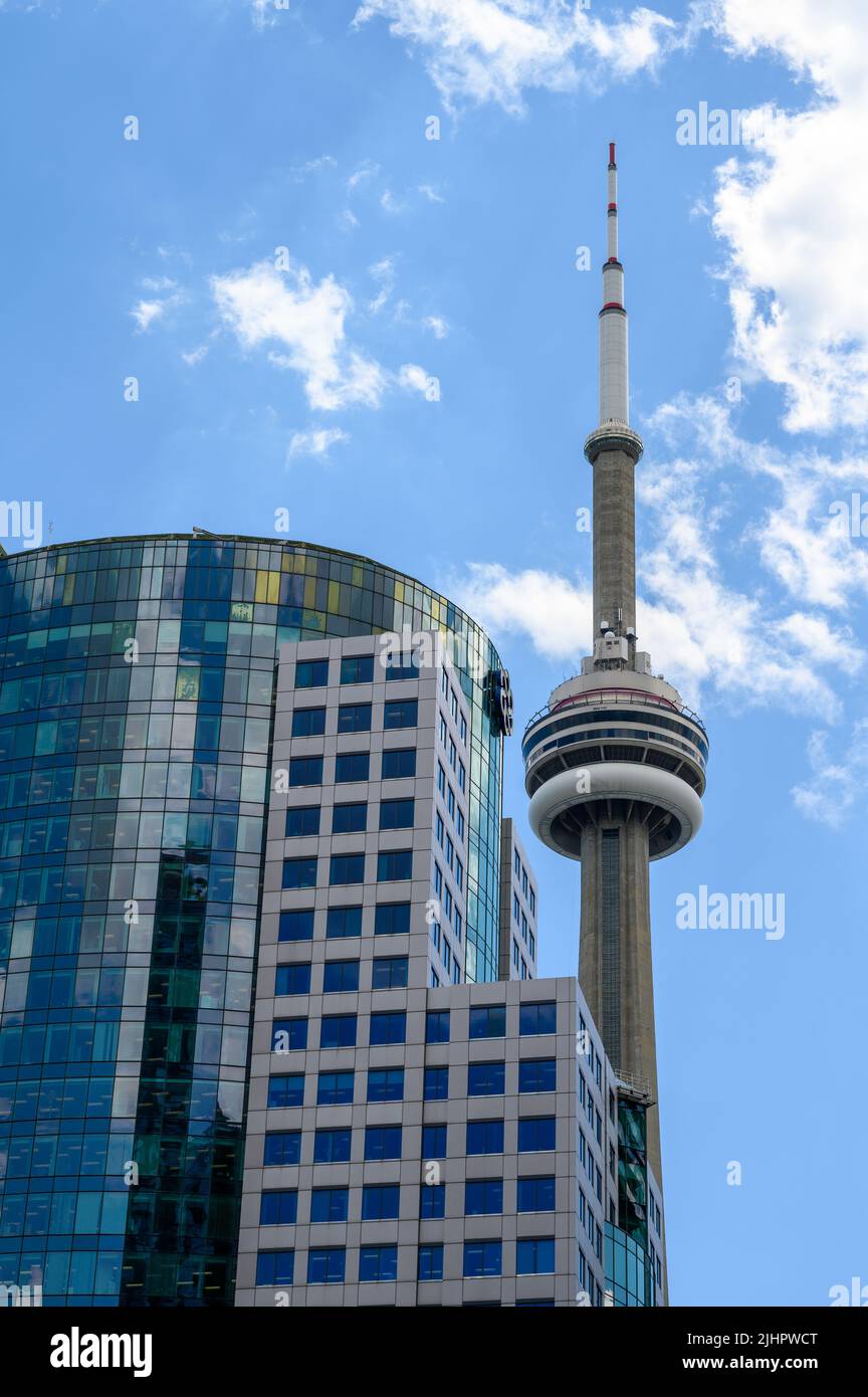 CN Tower rising up behind an office block in downtown Toronto, Ontario, Canada. Stock Photo