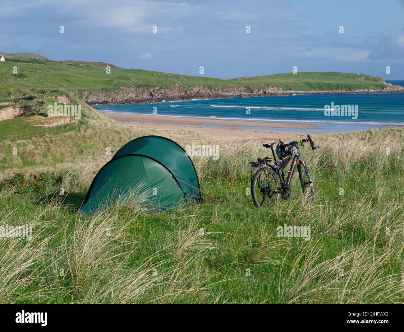 Cycle camping at Armadale Beach, Sutherland Stock Photo