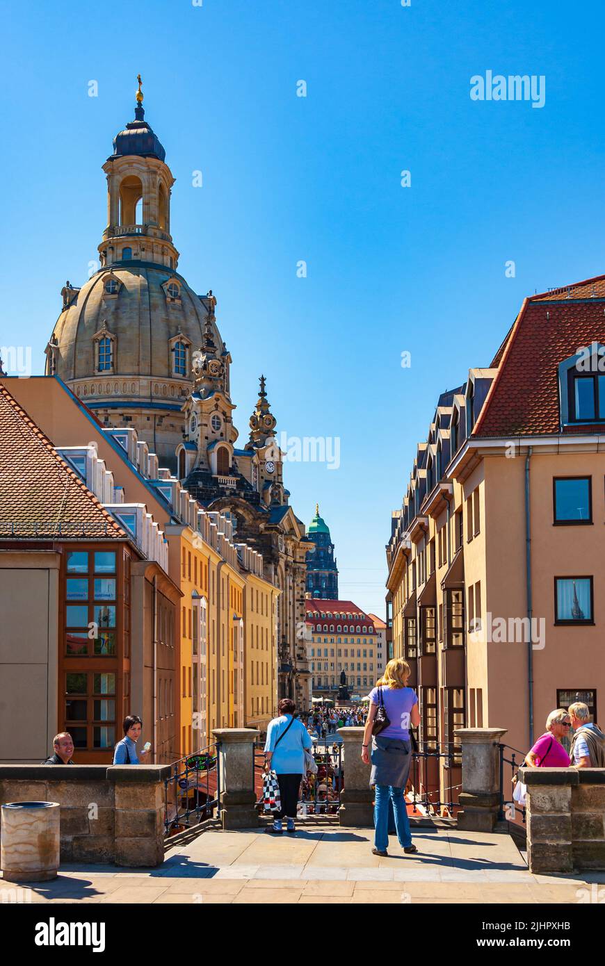 Dresden, Saxony, Germany, May 24, 2009: Numerous tourists and day trippers stroll along Bruehl Terrace and enjoy the view of the Frauenkirche church. Stock Photo