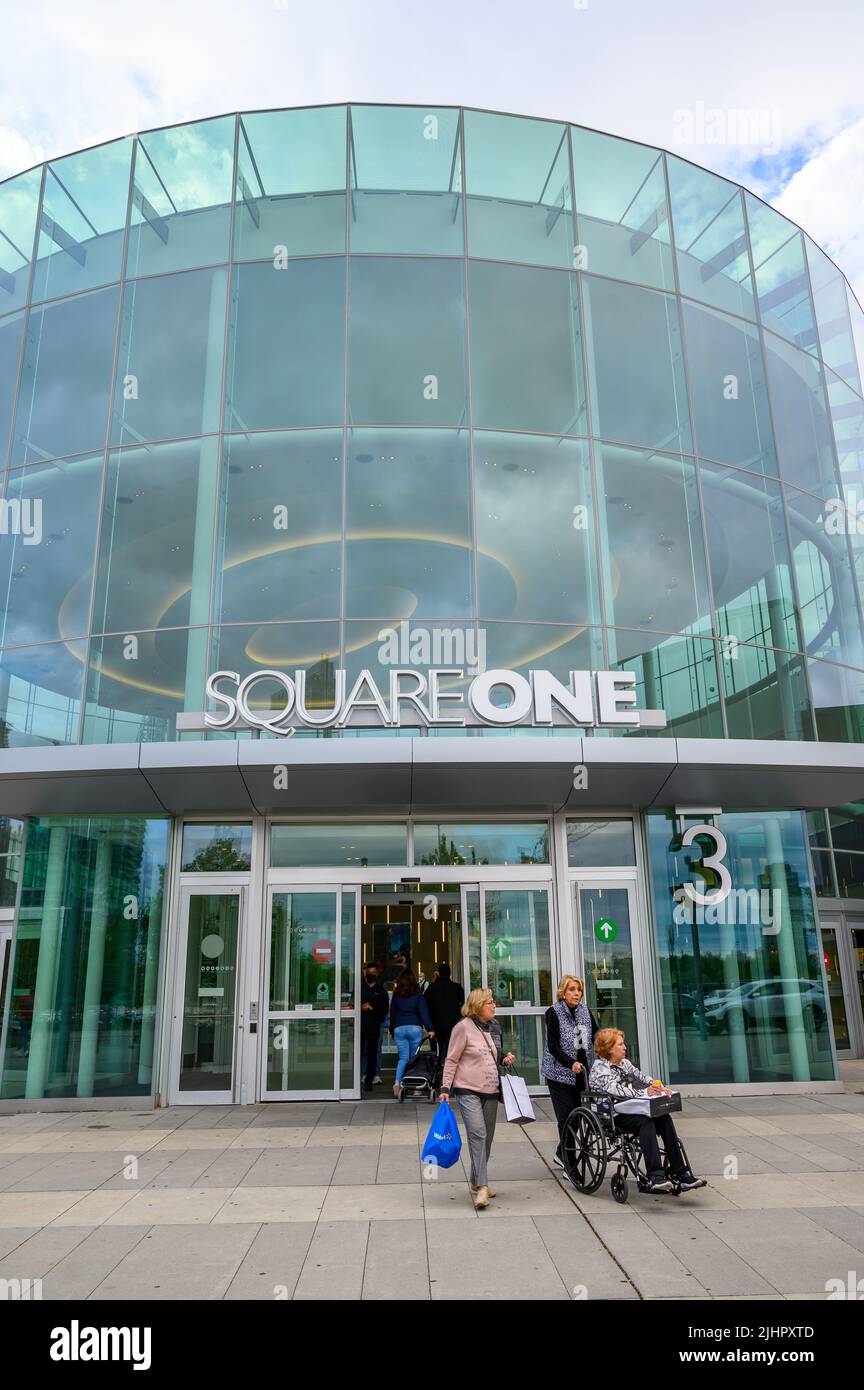 Assisted wheelchair shopper leaving Square One Shopping Centre