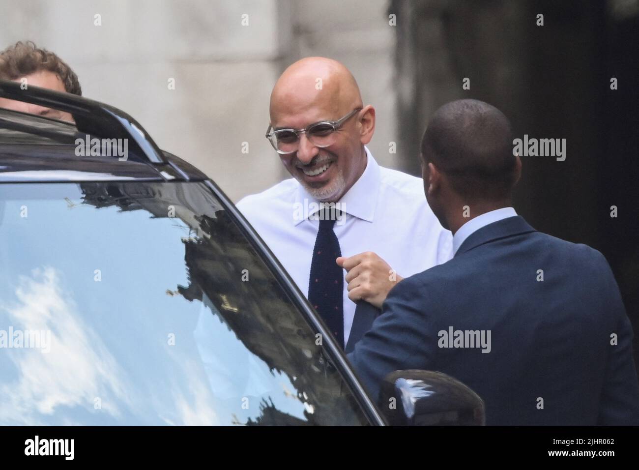 British Chancellor of the Exchequer Nadhim Zahawi enters a car between buildings in the houses of Parliament, in London, Britain, July 20, 2022. REUTERS/Toby Melville Stock Photo