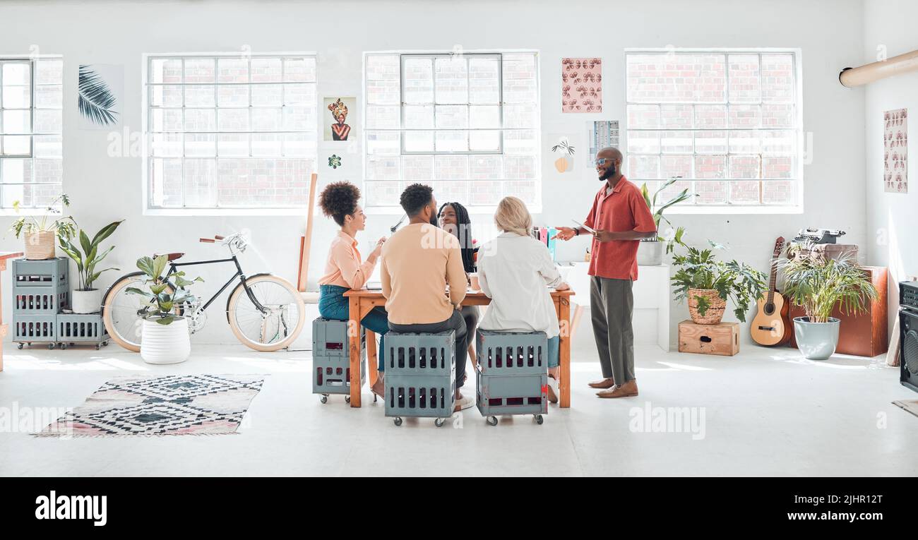 Group of diverse businesspeople having a meeting in a modern office at ...