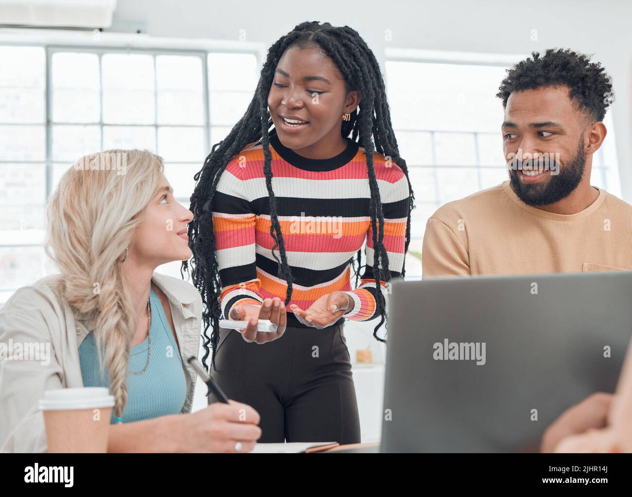 Group of diverse businesspeople having a meeting in a modern office at ...
