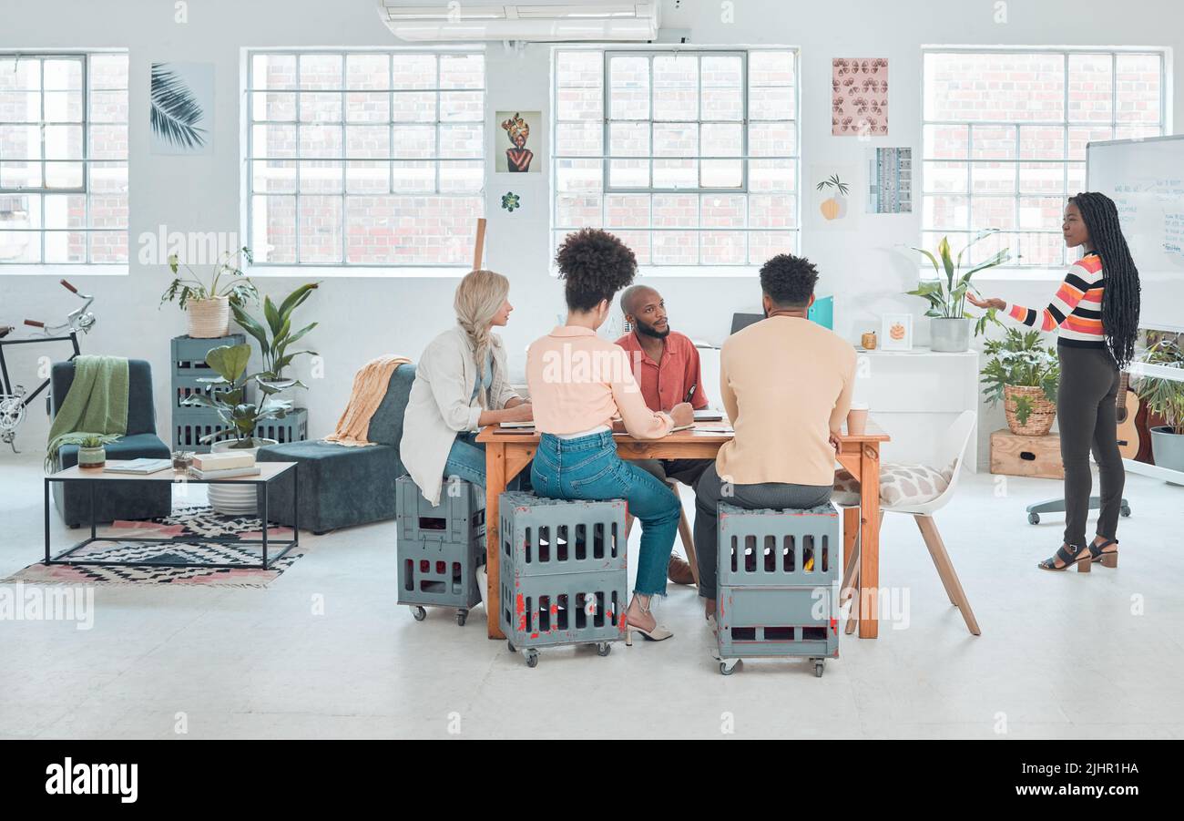 Group of diverse businesspeople having a meeting in a modern office at ...