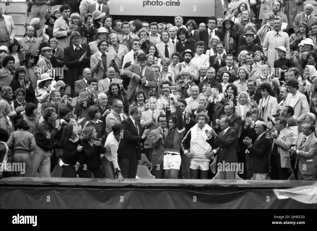Equadorian tennis player Guillermo Vilas, holding the Coupe des Mousquetaires after having won the men's singles final of the French Open (vs American Brian Gottfried). Paris, Roland-Garros stadium, June 5, 1977 Stock Photo