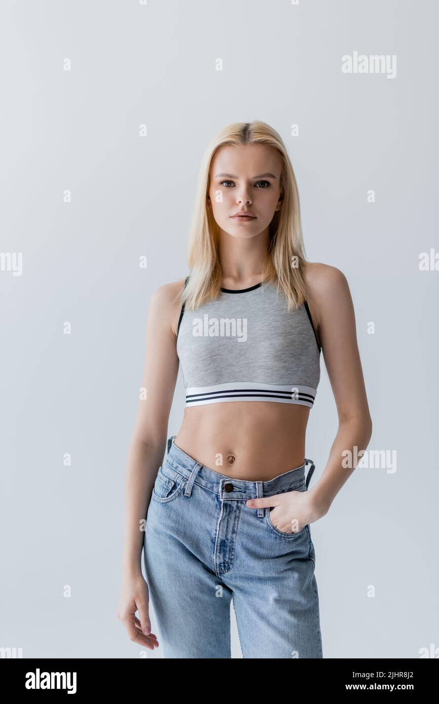 Pretty blonde woman in jeans hi-res stock photography and images - Alamy