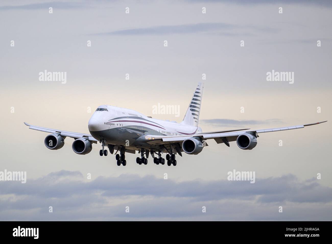 Munich, Germany - February 20. 2022 : Qatar Amiri Flight Boeing 747-8 with the aircraft registration A7-HBJ is landing on the southern runway 26L of t Stock Photo