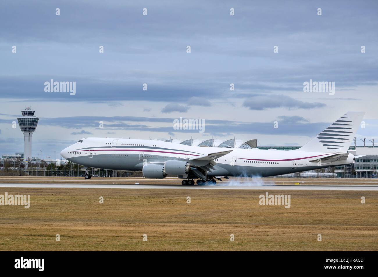 Munich, Germany - February 20. 2022 : Qatar Amiri Flight Boeing 747-8 with the aircraft registration A7-HBJ is landing on the southern runway 26L of t Stock Photo