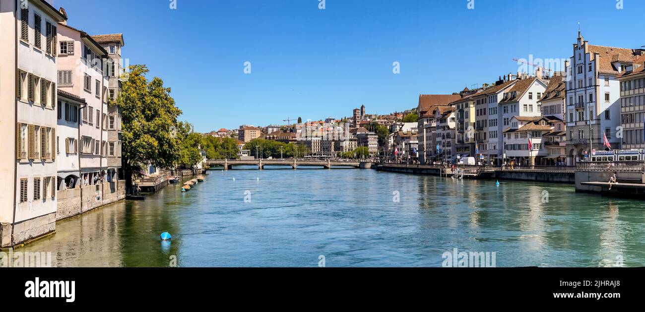 Poster view of Zurich with the Limmatquai promenade and the view down the river to the city of Zurich, Switzerland Stock Photo