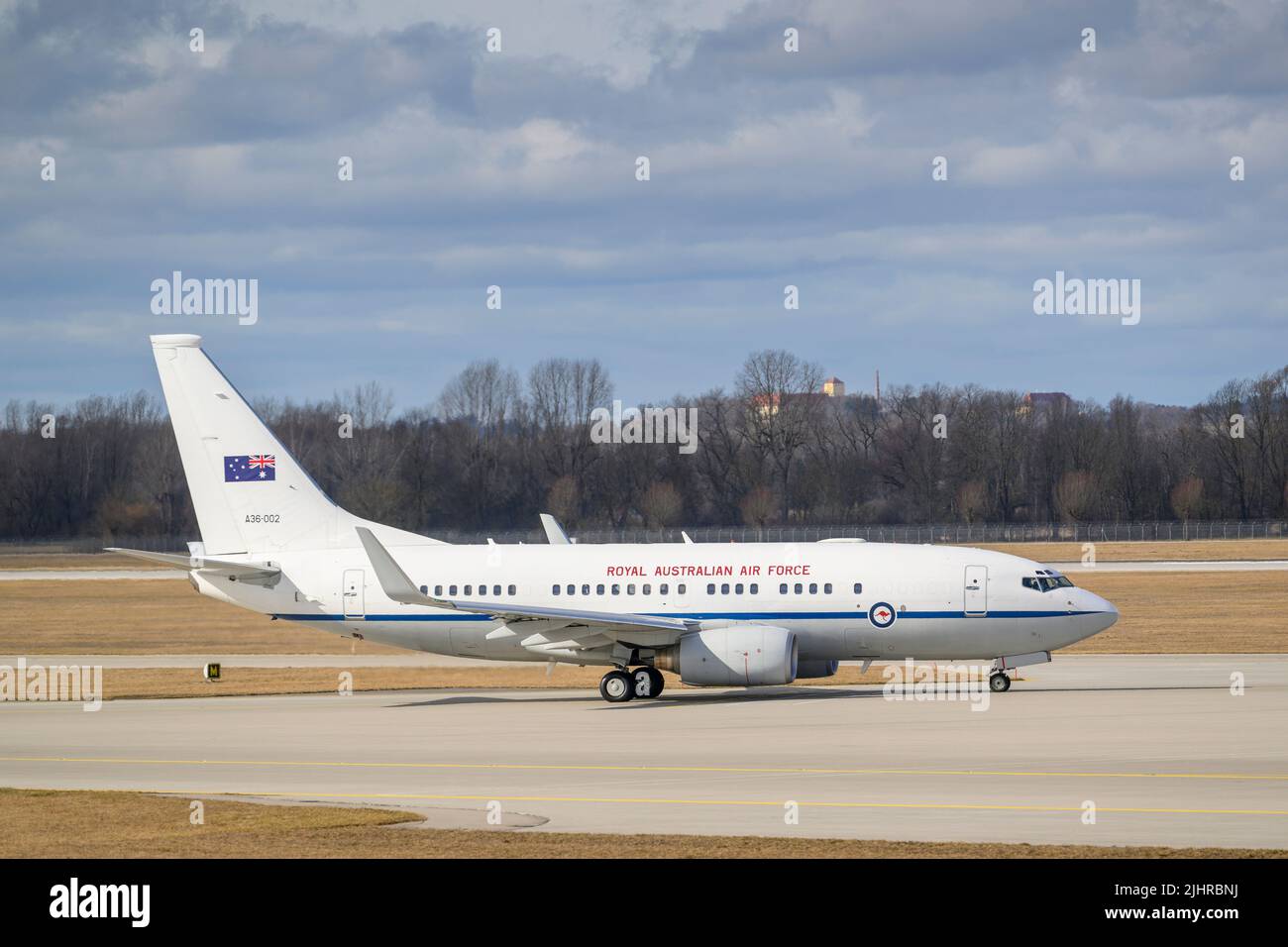 Munich, Germany - February 20. 2022 : Royal Australian Air Force Boeing 737-700 BBJ with the aircraft registration A36-002 is taxiing for take off on Stock Photo