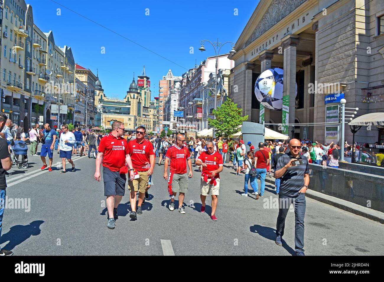 Happy Liverpool fans in red uniform before UEFA Champions League Final 2018 in Kiev, Ukraine. FC Real Madrid Stock Photo