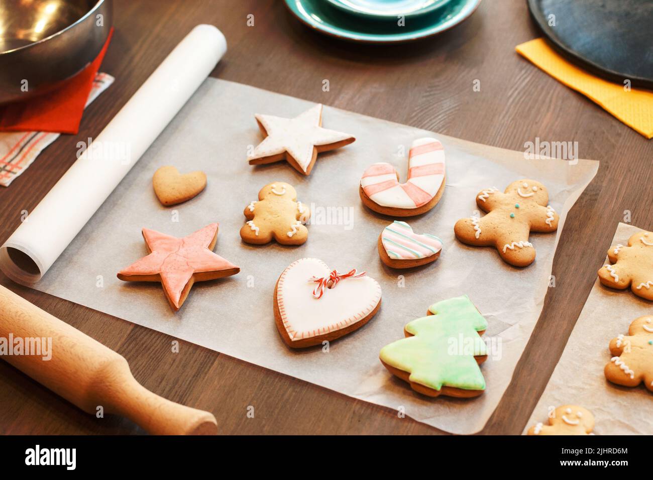 Colorful gingerbread cookies on culinary parchment Stock Photo